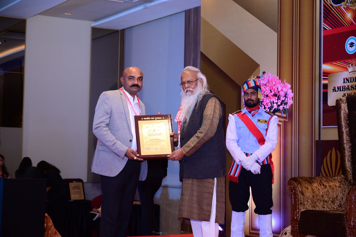 Volkschem directors receiving award for pesticide manufacturing excellence